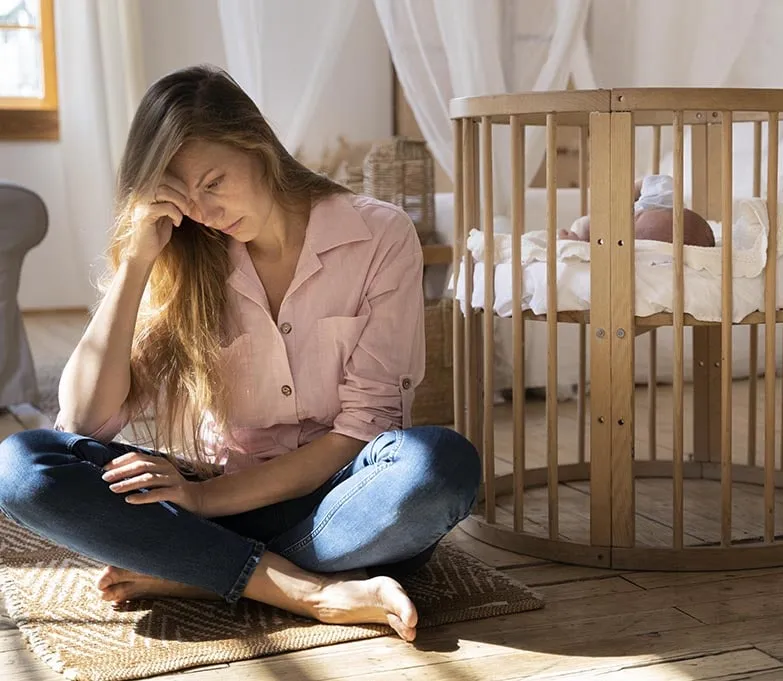 A mom suffering from postpartum depression.