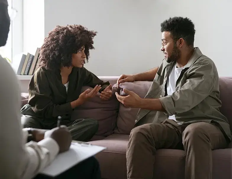 A couple in therapy talking about their issues.