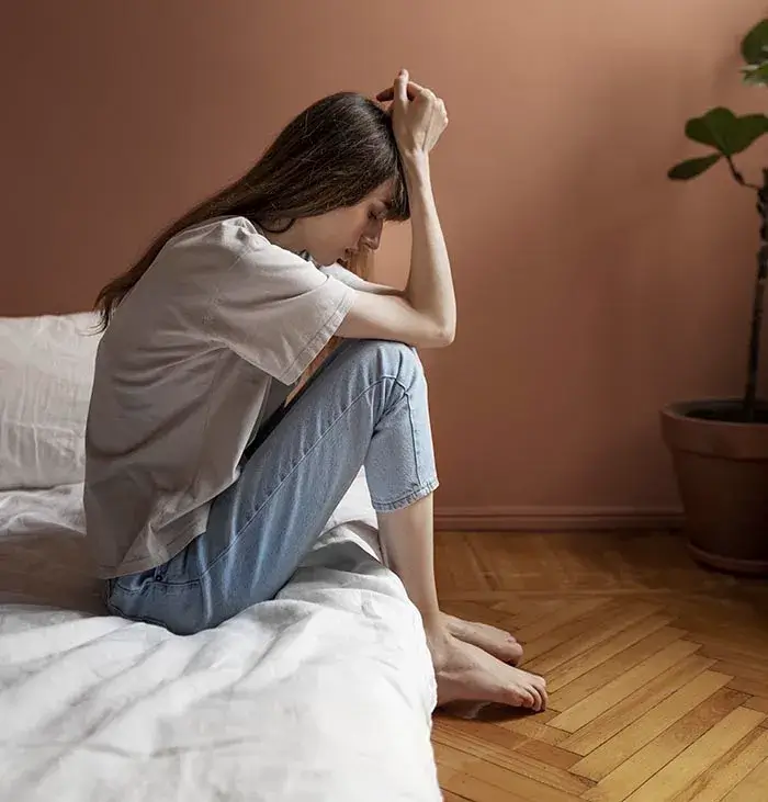 A young woman suffering from depression.